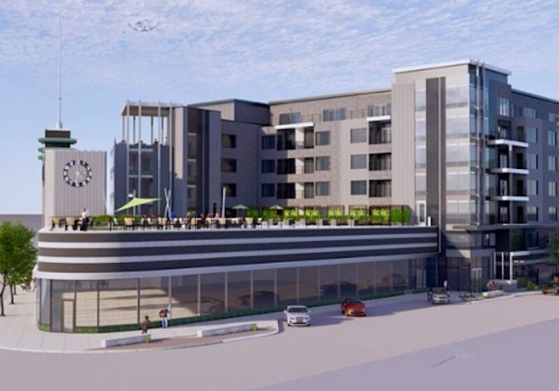 The Lux Living development plan calls for a six-story apartment building that would use the former Katz Drug as an amenity center for residents.