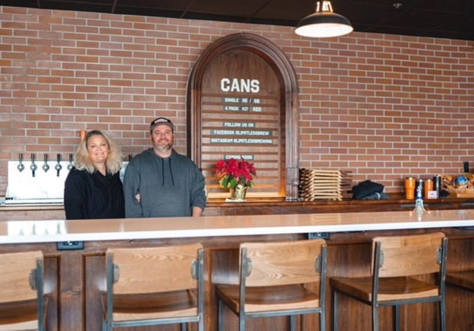 Emily Mobley (left) and Dave Mobley (right), of Limitless Brewing