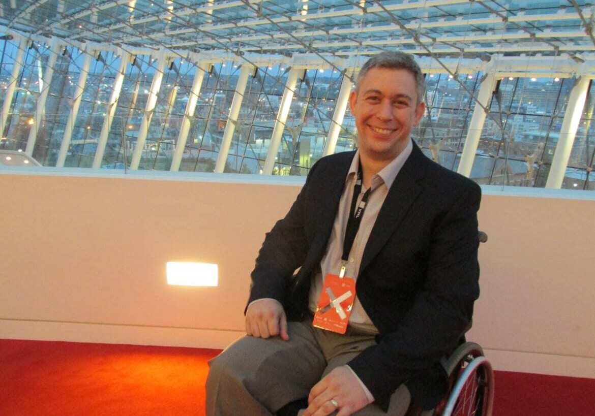 Martin Pistorius in wheelchair at Kauffman Center