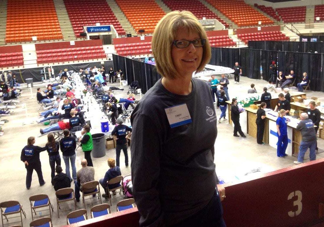 Cindy Reed, a Salina orthodontist, volunteered during the Kansas Mission of Mercy free dental clinic that drew 1,400 people to Salina. (Photo: Bryan Thompson / Heartland Health Monitor)