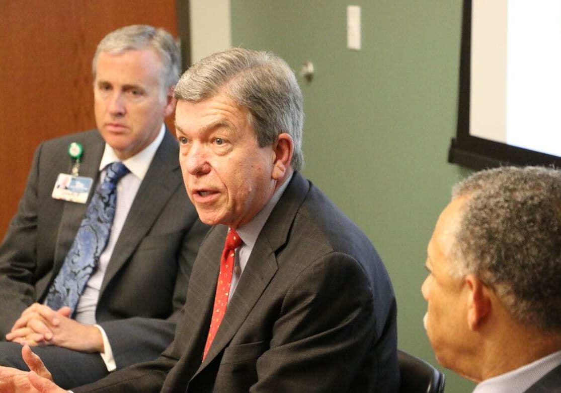 U.S. Sen. Roy Blunt (center), a Missouri Republican, visited Kansas City Thursday as part of a mental health tour he took around the state. He spoke at a round table discussion at the offices of Truman Medical Centers' Behavioral Health Services. Joining Blunt at the head table were Charlie Shields (left), chief operating officer of Truman's Lakewood facility, and John Bluford, president and CEO of the Truman system. (Photo by Mike Sherry/The Hale Center for Journalism