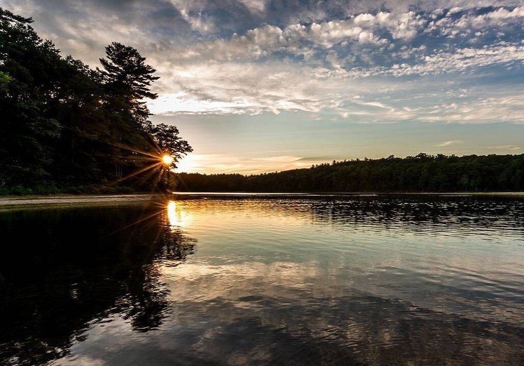 Walden Pond at sunset in Concord, Massachusetts.