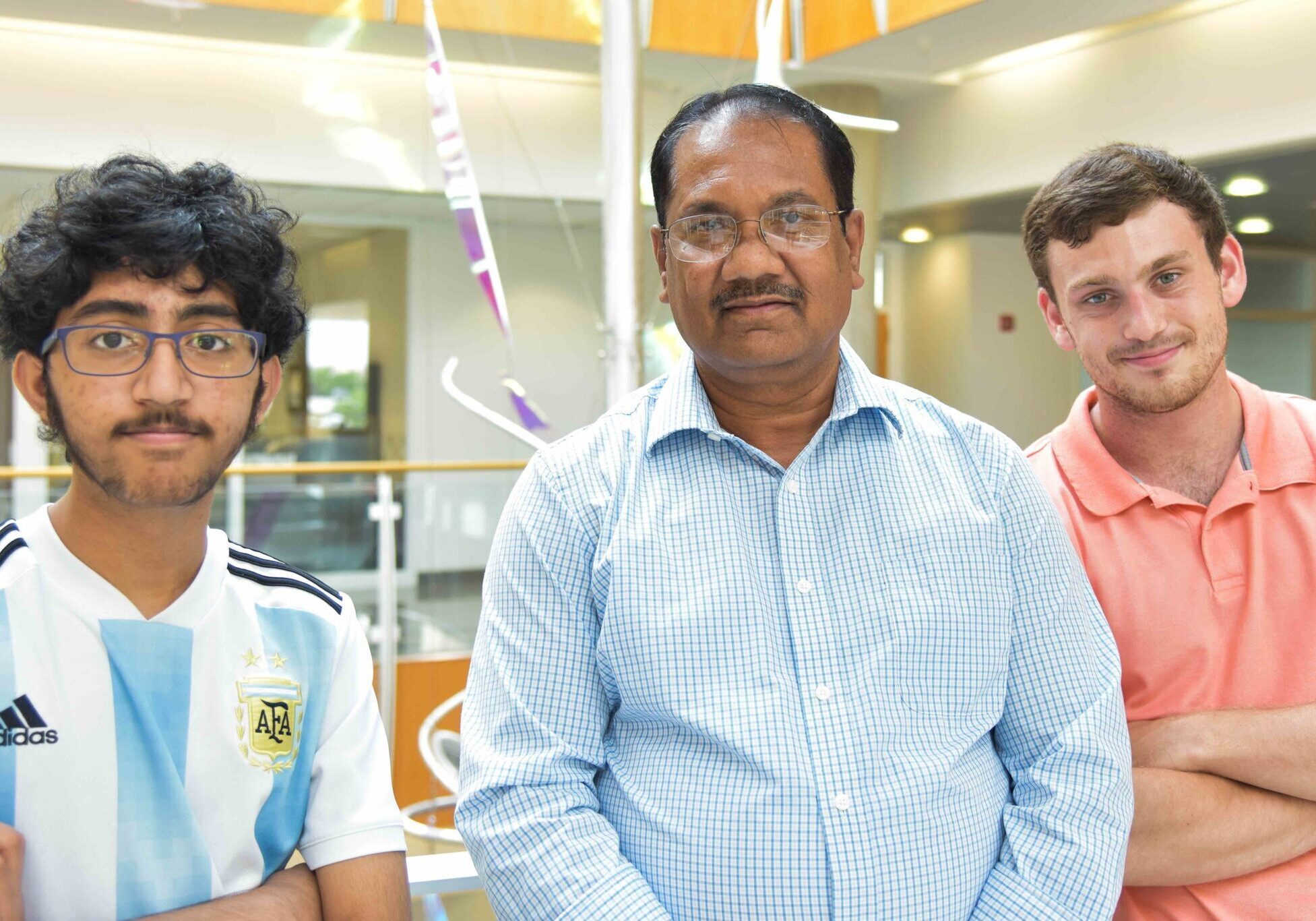 From left to right: Hickman Mills sophomore Saathvik Kannan, MU principal investigator Kamal, Singh, and MU undergraduate Austin Spratt. They're working together at Bond Life Sciences Center in Columbia to identify new SARS-CoV-2 variants. (Credit: Christopher S. Bond Life Sciences Center”)