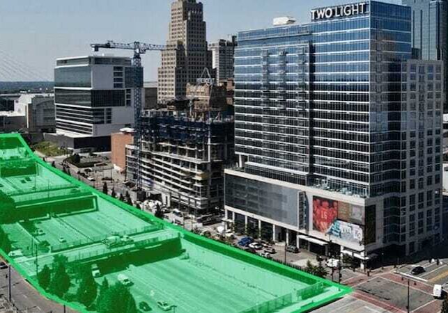 Rendering shows the four blocks of the downtown freeway loop that would be covered with a deck that would create a public space.