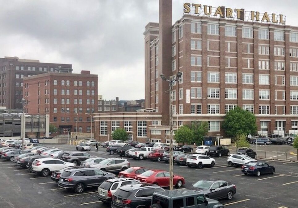 The Tracks apartment project will be built on this parking lot next to the historic Freight House building.