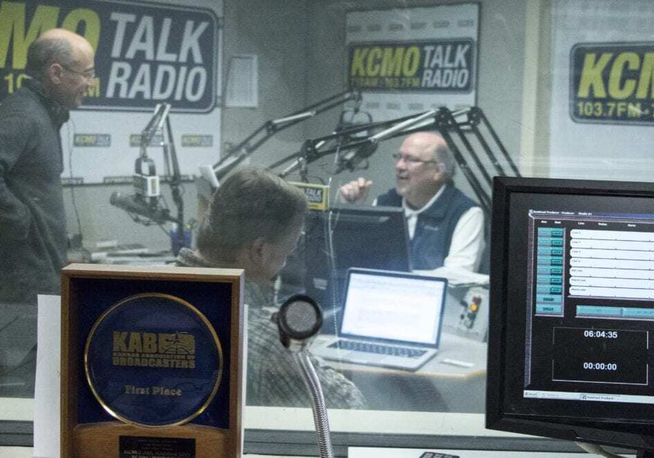 Zedek talks with Hill before a show