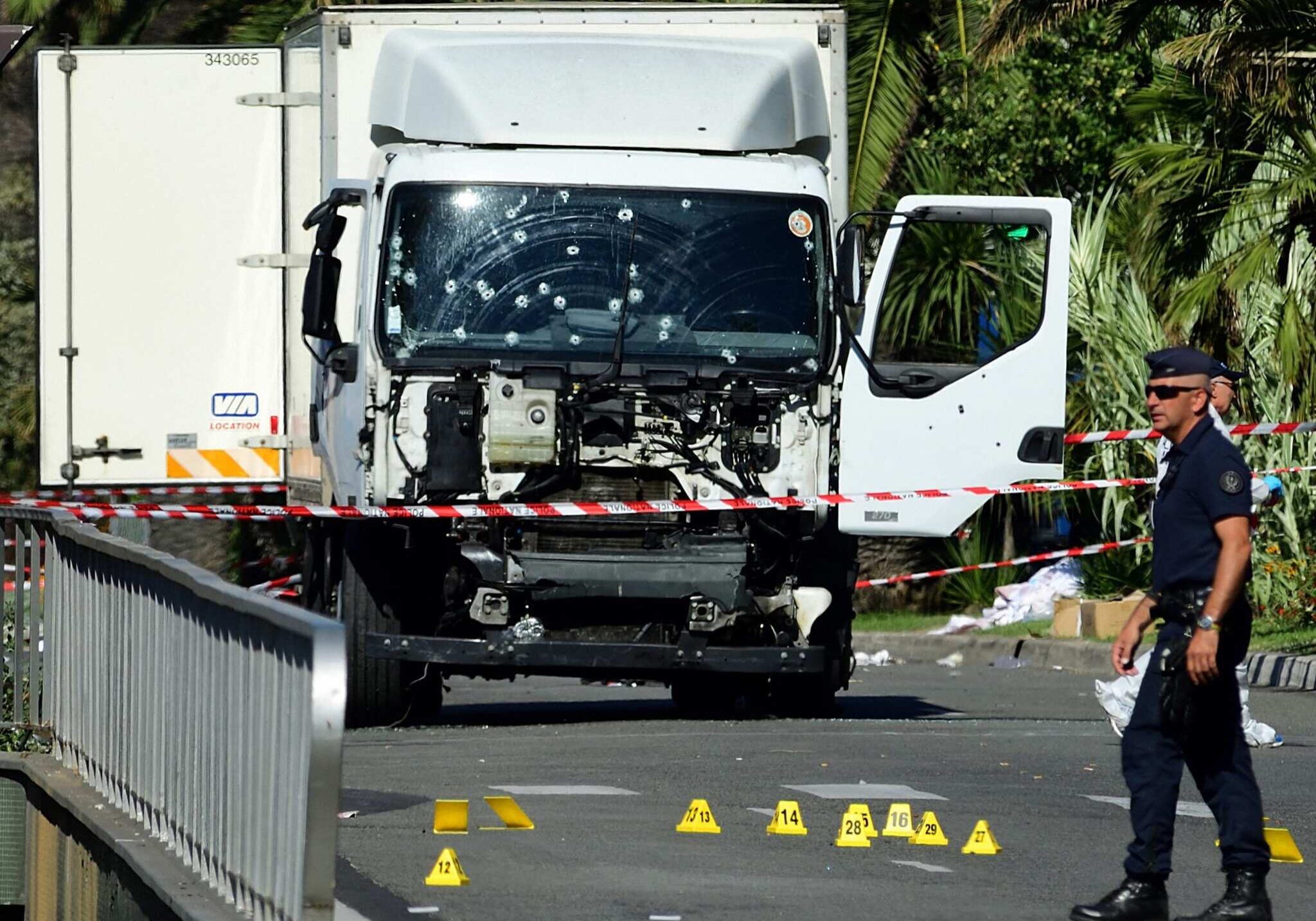 A truck with bullet holes.
