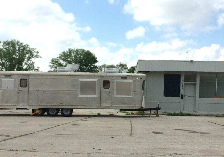 A food truck parked in a parking lot.