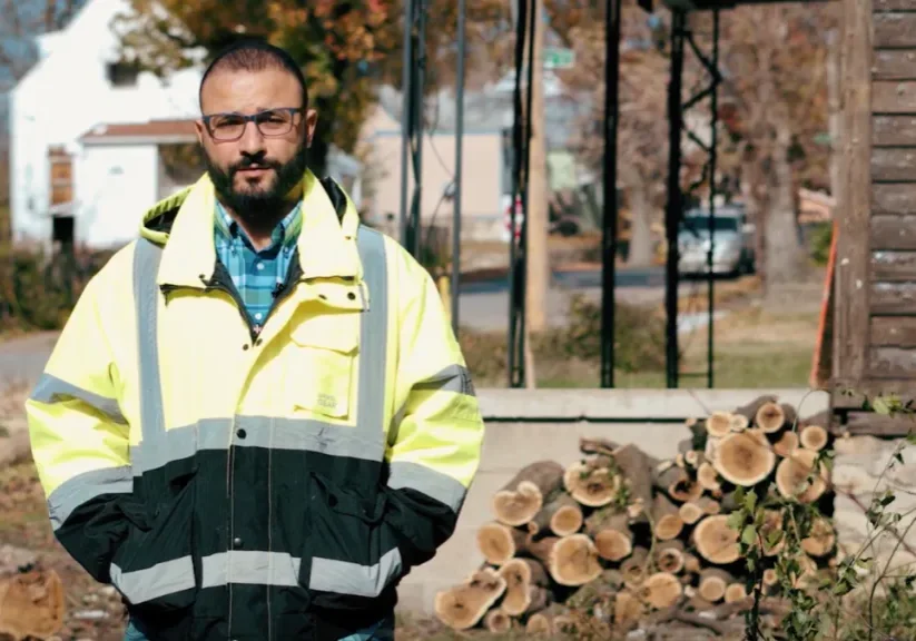 Reda Ibrahim in front of a worksite where he is building an affordable, energy-efficient home in Kansas City’s Lykins neighborhood. (Courtesy of Mercy in the City)