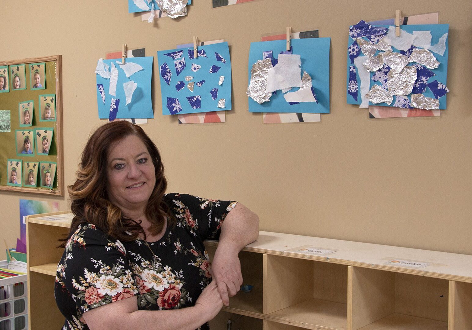 Sheri Lee stands in playroom at her facility