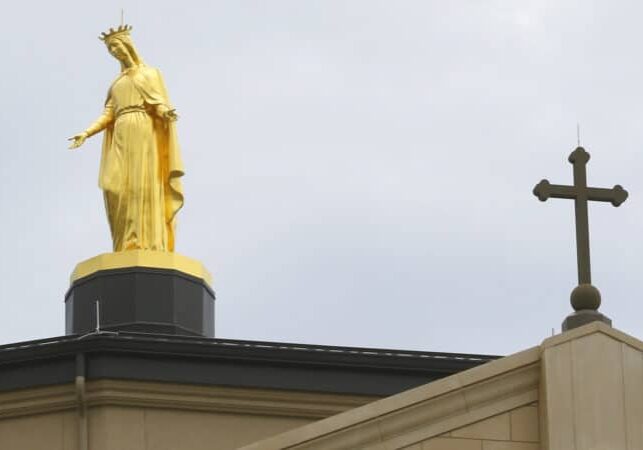 A Virgin Mary statue stands positioned at the top of the Immaculata in St. Marys, Kansas. The sect that built it, the Society of St. Pius X, has been excommunicated. (Photo by Thad Allton for Kansas Reflector)
